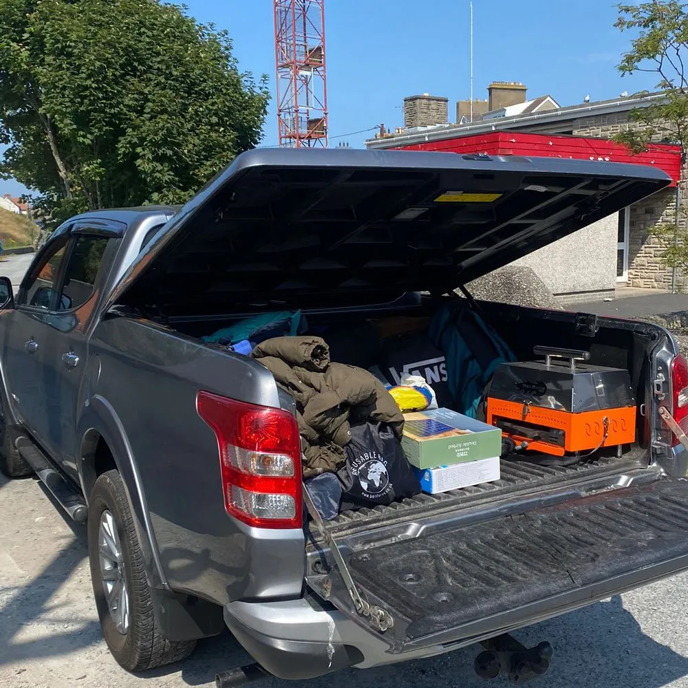 portable bbq packed in car